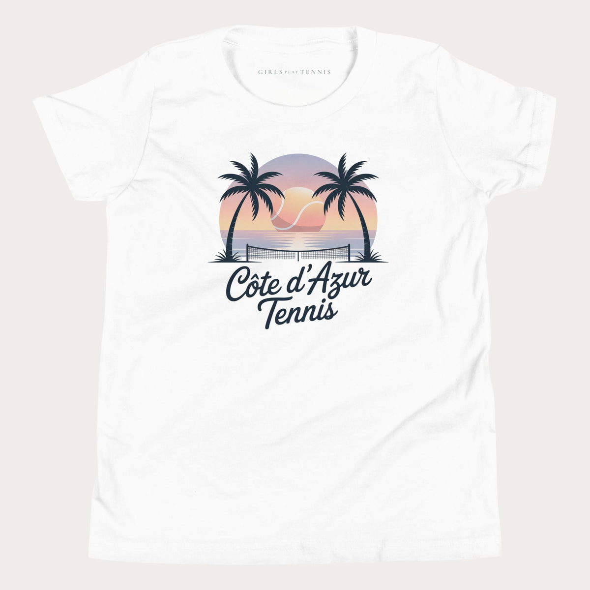 White Côte d'Azur girls' tennis T-shirt with palm trees and a sunset graphic above script lettering