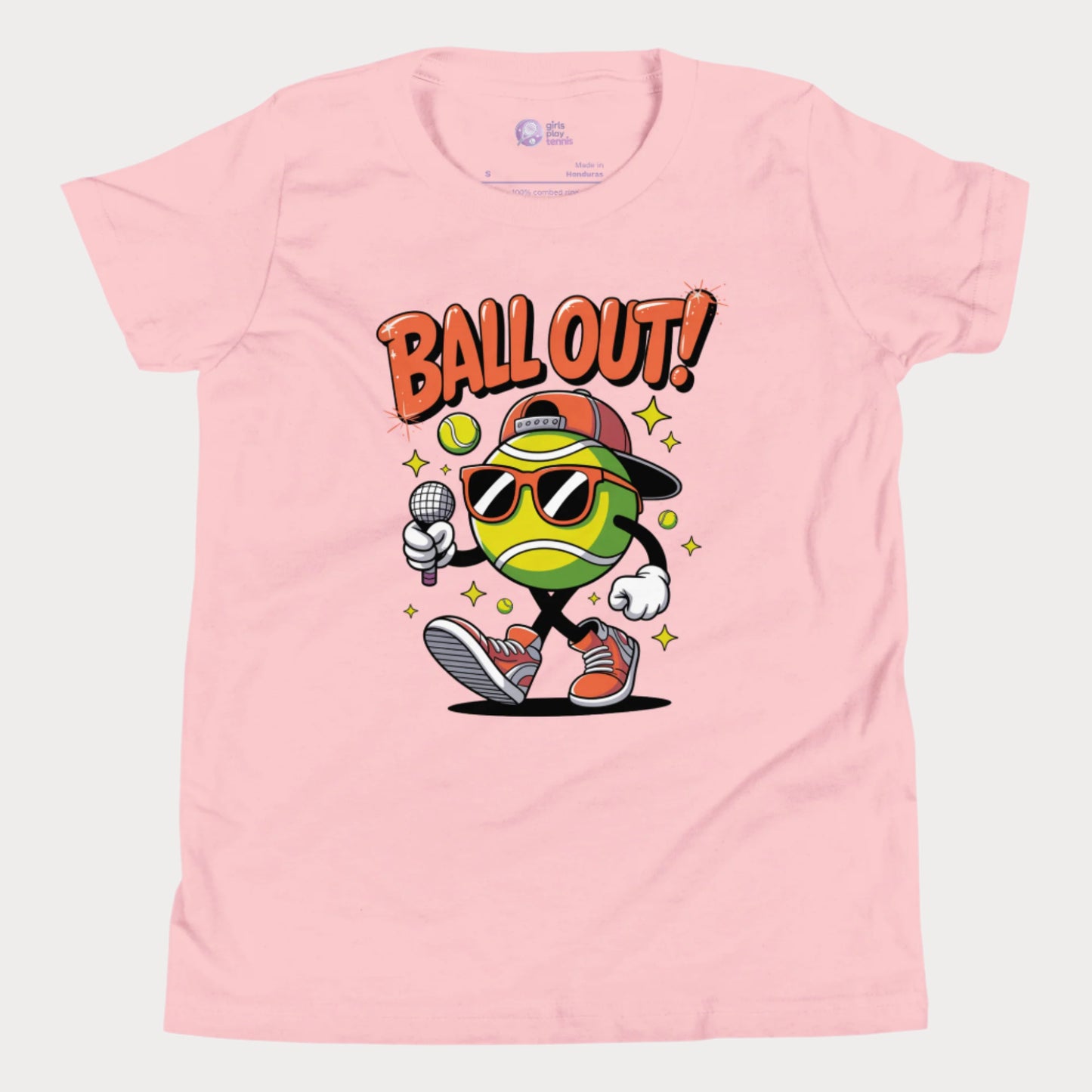 Pink girls tennis t-shirt with "Ball Out!" slogan and cartoon tennis ball character in shades and sneakers holding a mic.