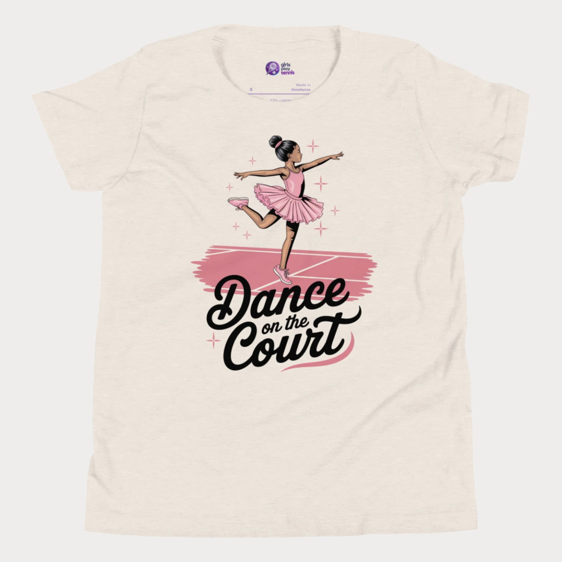 A stylish beige girls' tennis t-shirt featuring a graceful young ballerina in a pink tutu performing an elegant pose on a tennis court. The text 'Dance on the Court' blends ballet and tennis, celebrating the fluid movement and grace of the game. Designed for young girls who love tennis and fashion, this Girls Play Tennis apparel piece adds a fun, feminine twist to the sport.