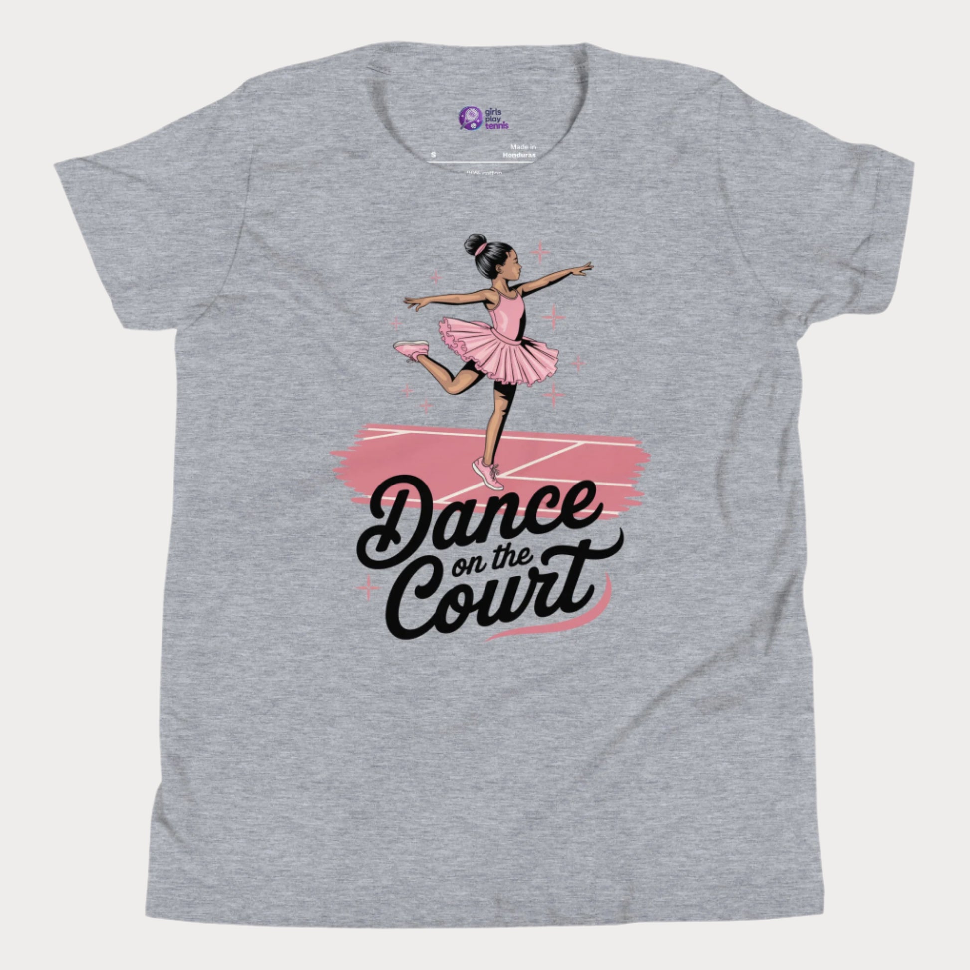 A stylish grey girls' tennis t-shirt featuring a graceful young ballerina in a pink tutu performing an elegant pose on a tennis court. The text 'Dance on the Court' blends ballet and tennis, celebrating the fluid movement and grace of the game. Designed for young girls who love tennis and fashion, this Girls Play Tennis apparel piece adds a fun, feminine twist to the sport.