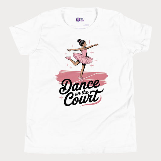 A stylish white girls' tennis t-shirt featuring a graceful young ballerina in a pink tutu performing an elegant pose on a tennis court. The text 'Dance on the Court' blends ballet and tennis, celebrating the fluid movement and grace of the game. Designed for young girls who love tennis and fashion, this Girls Play Tennis apparel piece adds a fun, feminine twist to the sport.
