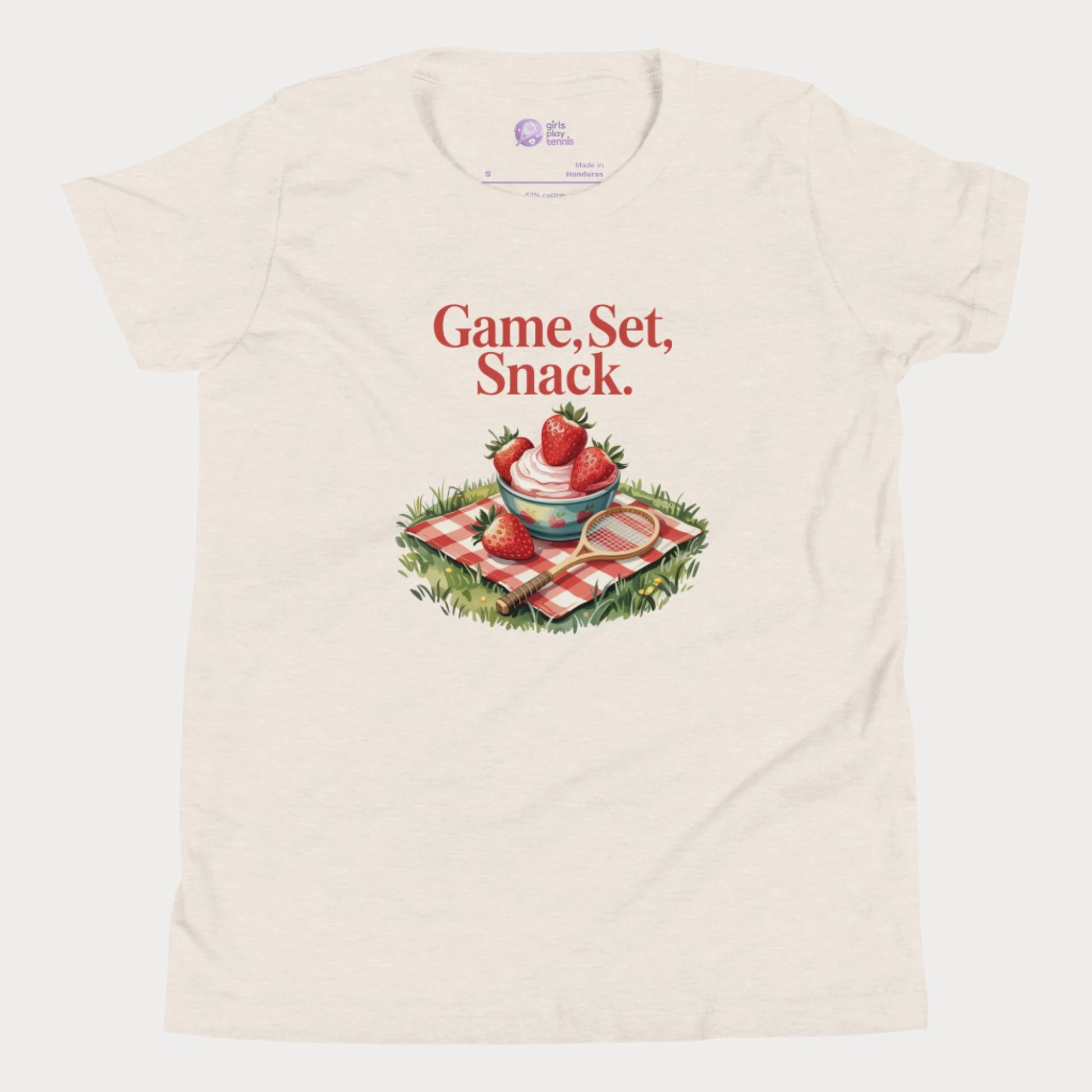 Beige girls tennis t-shirt with strawberries and cream picnic design – Game Set Snack slogan from Grass Court Collection
