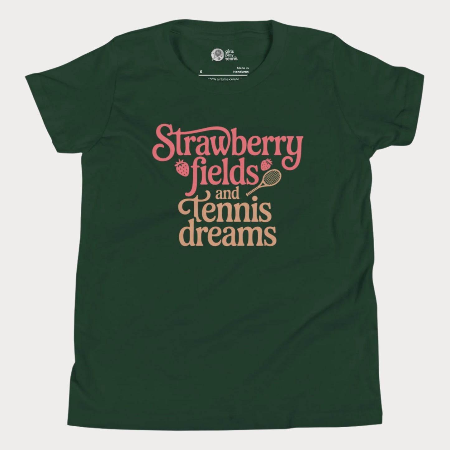 Green girls tennis t-shirt with retro text that reads ‘Strawberry fields and tennis dreams’ with tennis and strawberry icons