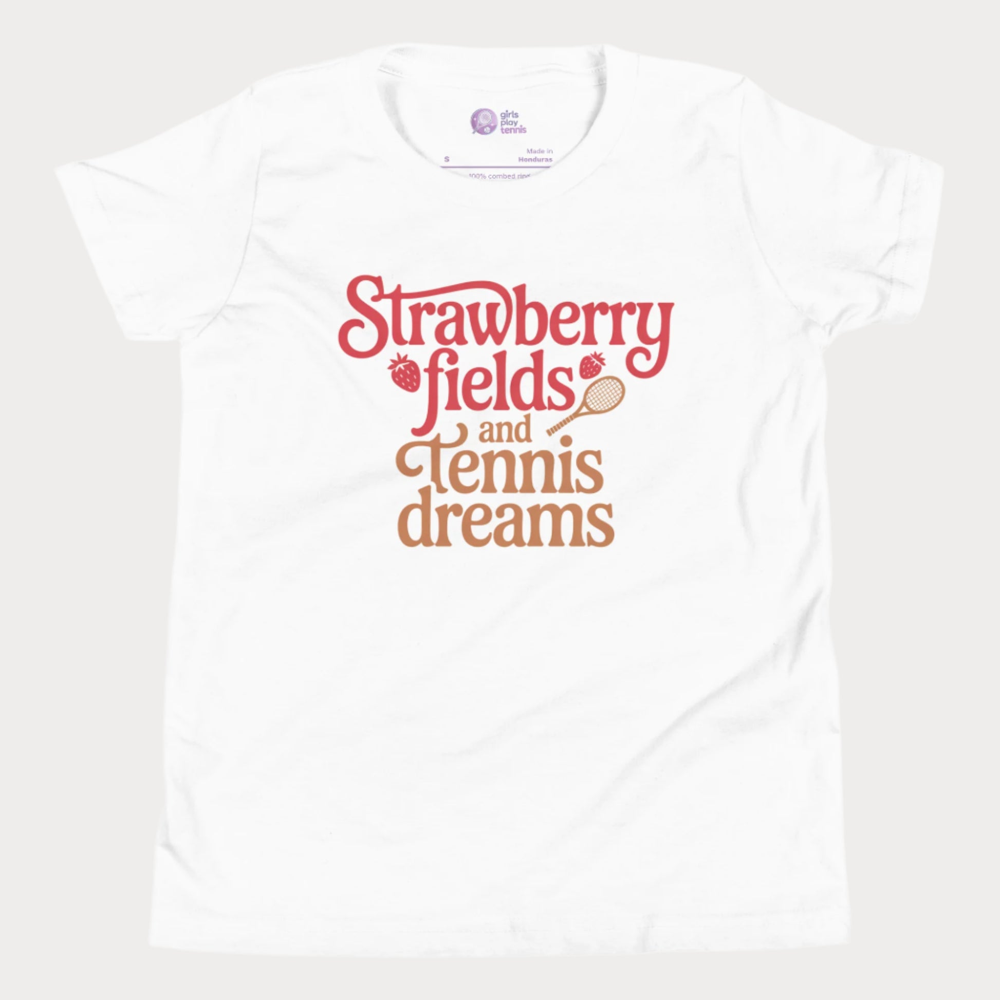 White girls tennis t-shirt with retro text that reads ‘Strawberry fields and tennis dreams’ with tennis and strawberry icons