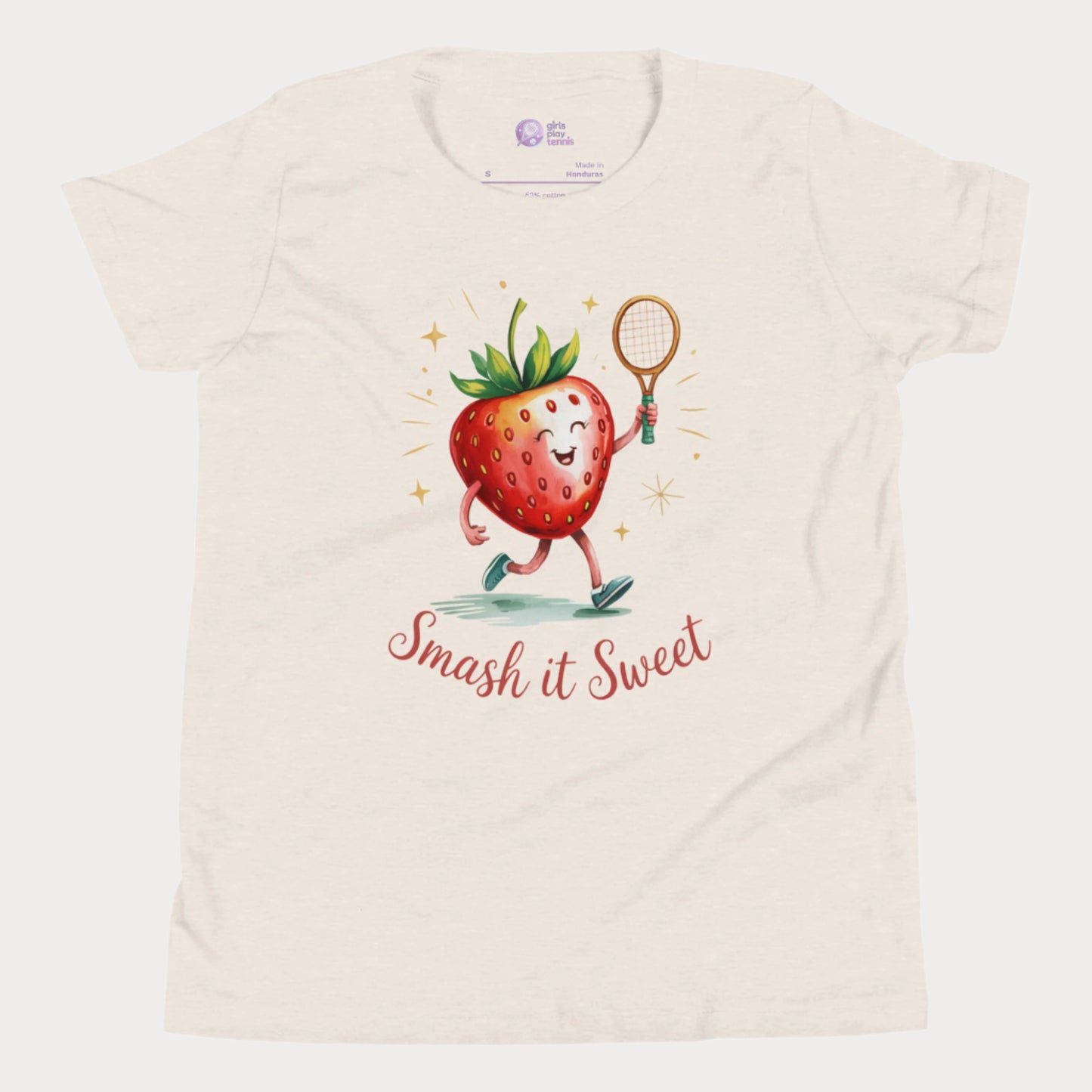 Beige girls tennis t-shirt with cartoon strawberry holding tennis racket and “Smash it Sweet” slogan