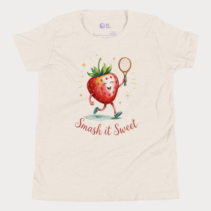 Beige girls tennis t-shirt with cartoon strawberry holding tennis racket and “Smash it Sweet” slogan