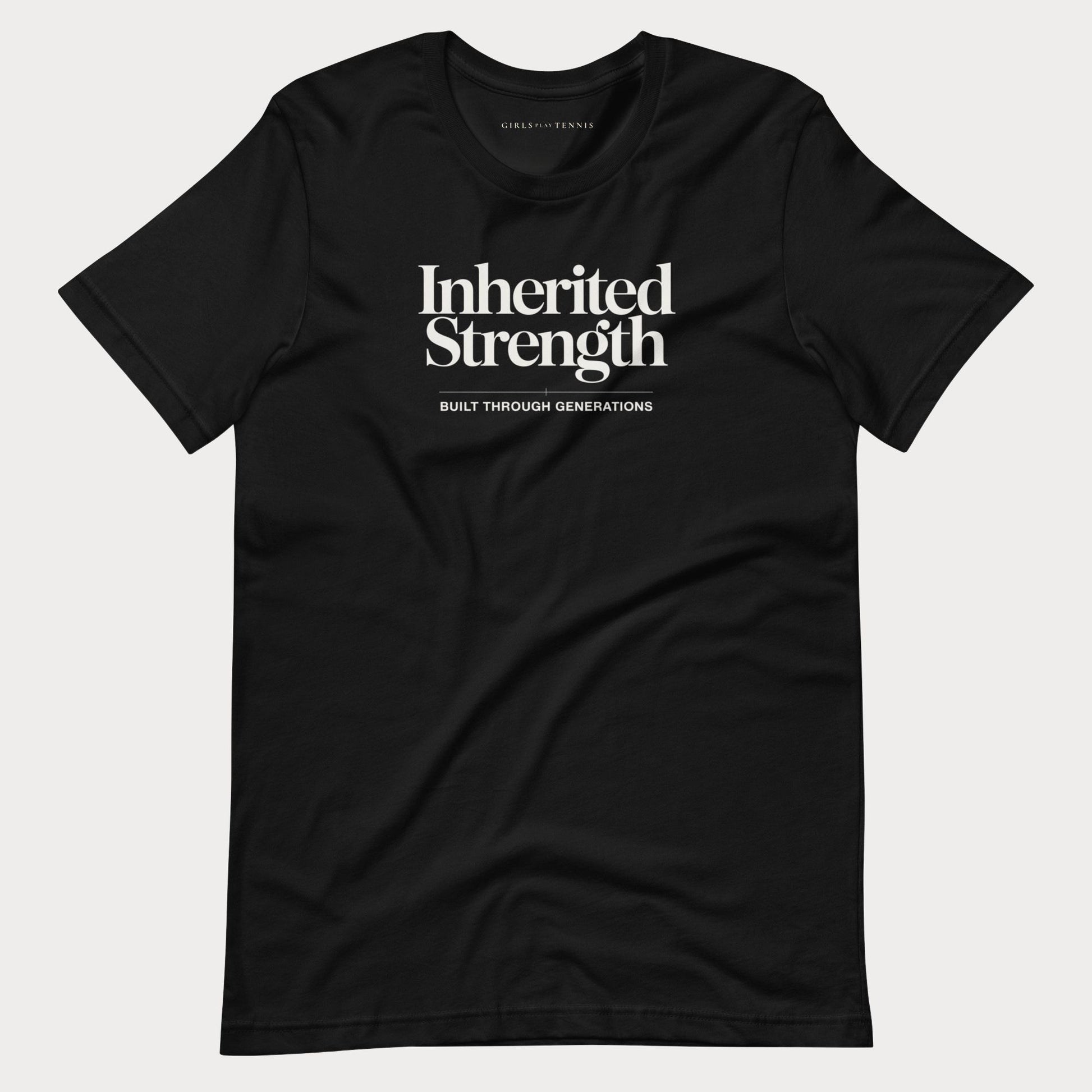 A black short-sleeve crewneck women's tennis t-shirt with white printed text reading 'Inherited Strength' and 'BUILT THROUGH GENERATIONS' on the chest, displayed flat against a light gray background.