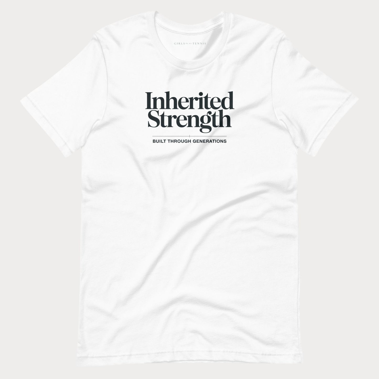 A white short-sleeve crewneck t-shirt with black text on the chest reading 'Inherited Strength' and 'BUILT THROUGH GENERATIONS' underneath, displayed on a light gray background.