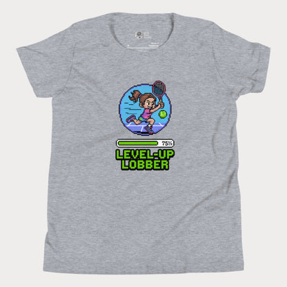 Girls Play Tennis Level Up Lobber t-shirt with XP badge, progress bar, and tennis girl graphic
