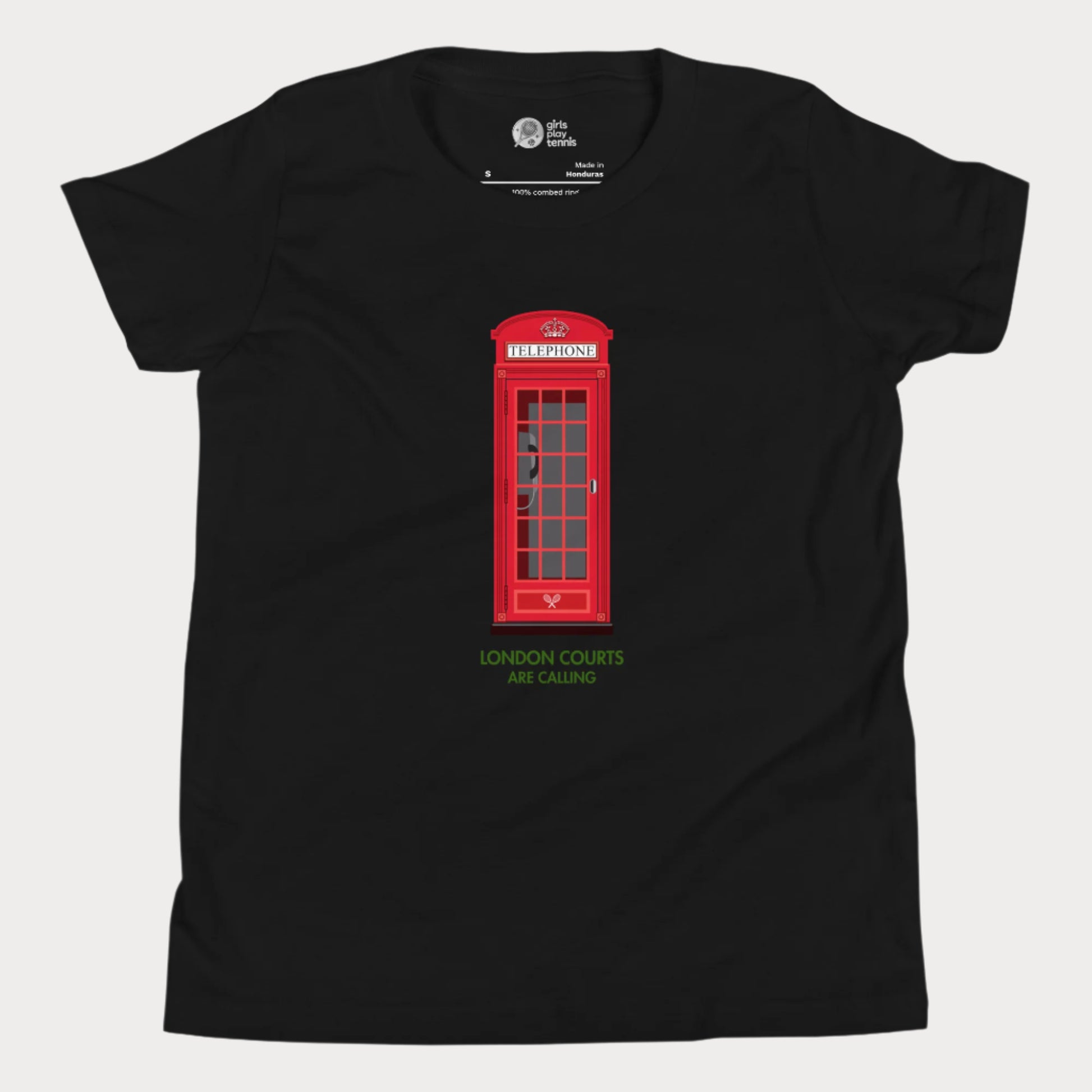 Black girls’ tennis T-shirt with red London phone booth and green grass court text.