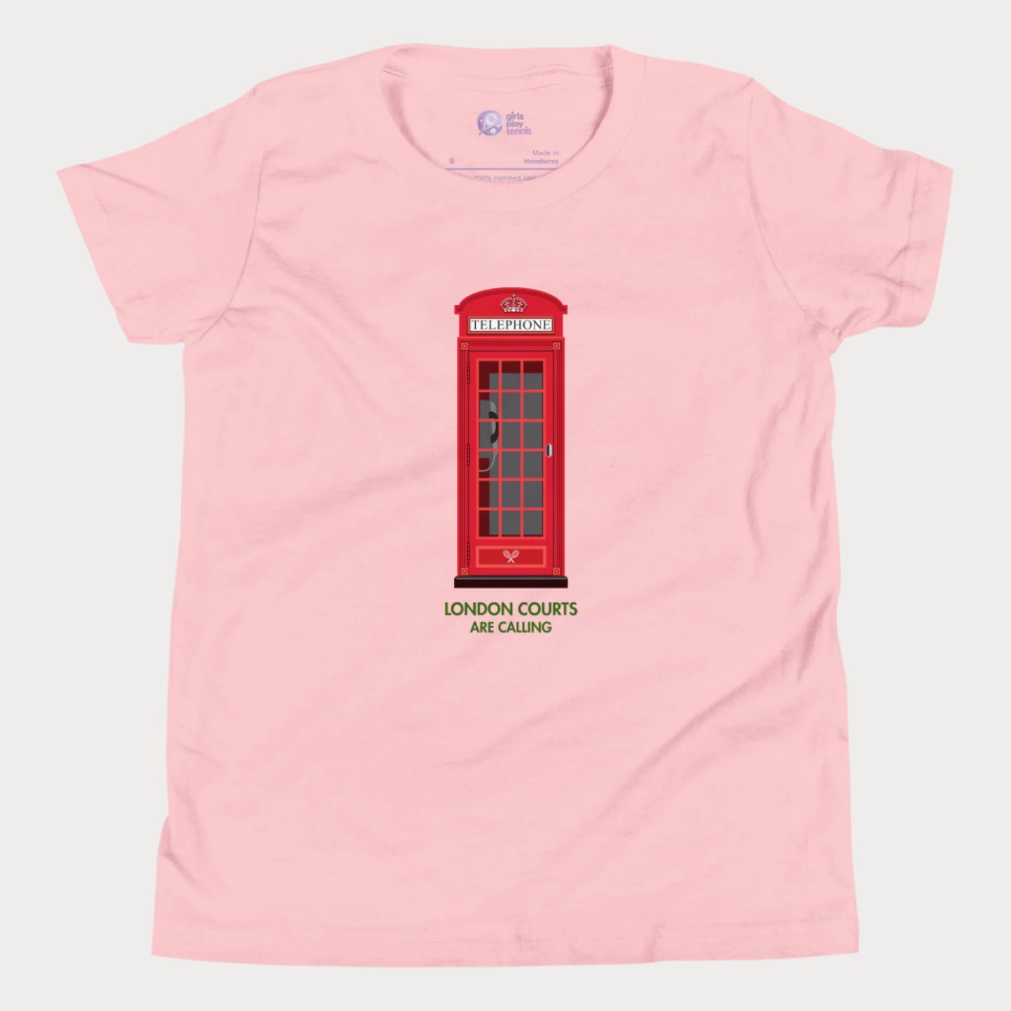 Pink girls’ tennis T-shirt with red London phone booth and green grass court text