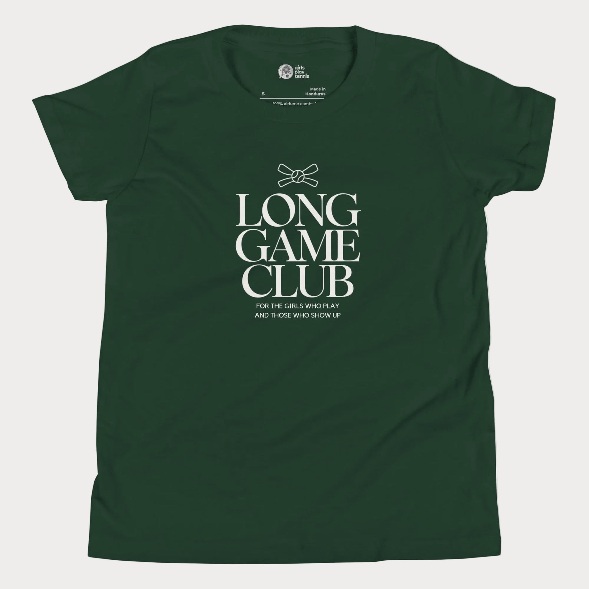 Long Game Club tennis tee in forest green with white typography and bow detail for girls and women