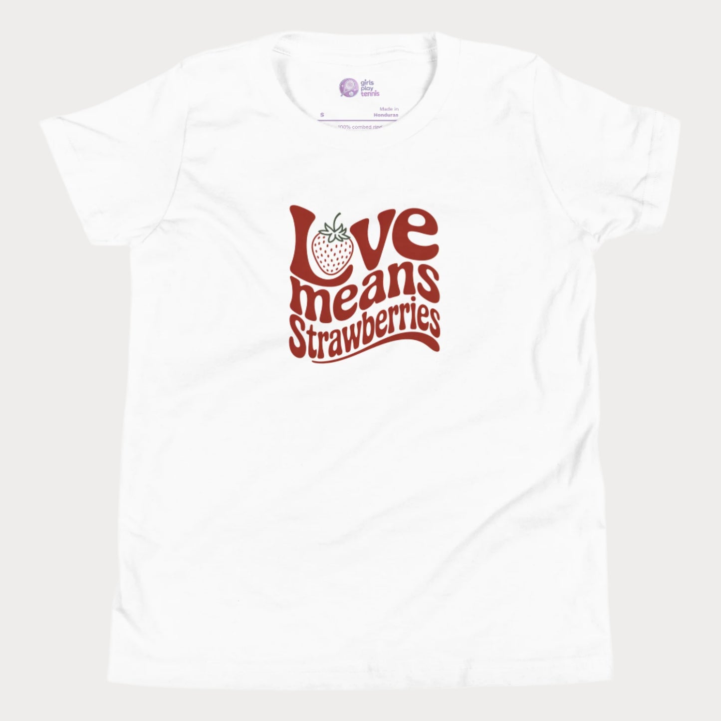 White girls’ tennis T-shirt with retro red “Love Means Strawberries” slogan and cute illustrated strawberry.