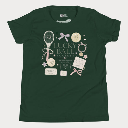 Forest girls tennis tee featuring lucky ball society artwork with bows, bracelets, and vintage tennis lifestyle details