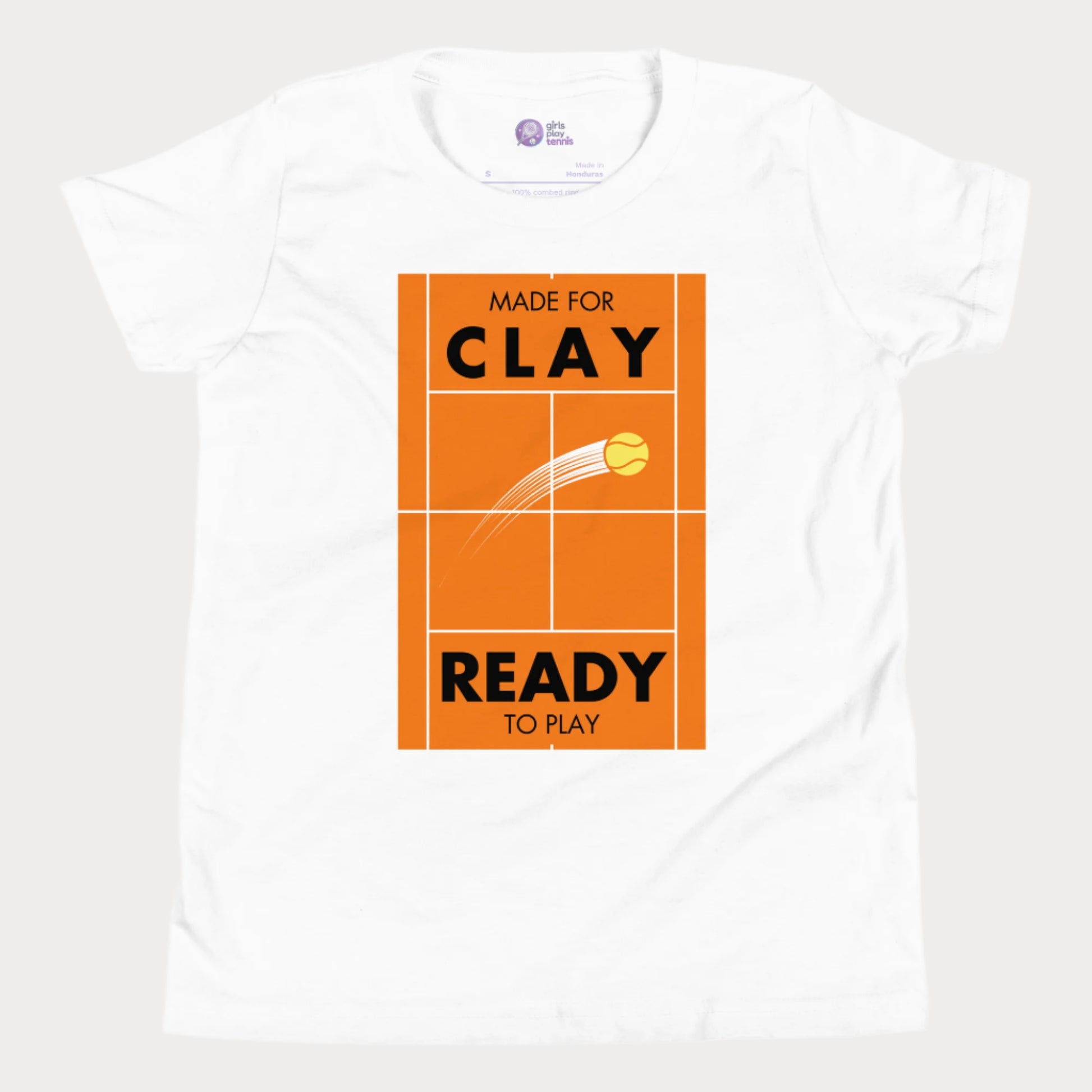 White kids' tennis T-shirt featuring an orange clay court design with a tennis ball in motion and the phrase "Made for Clay, Ready to Play." Perfect for young tennis players who love the clay season.