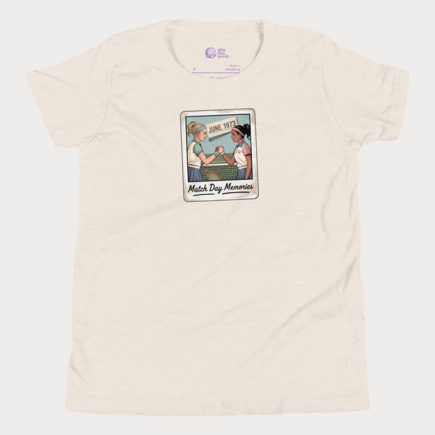 Polaroid-style illustration of two girls shaking hands on a tennis court with ‘June 1973’ and text reading Match Day Memories on a girls tennis t-shirt