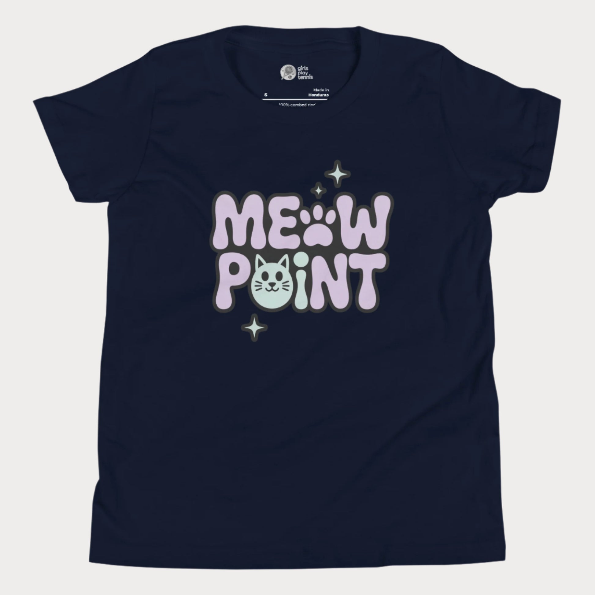 A navy girls’ tennis t-shirt with bold, bubble-style lettering that spells out “Meow Point” in pastel purple and black. The design includes a playful pink paw print for the letter "O" and a smiling cat face as the letter "I", surrounded by sparkly stars.