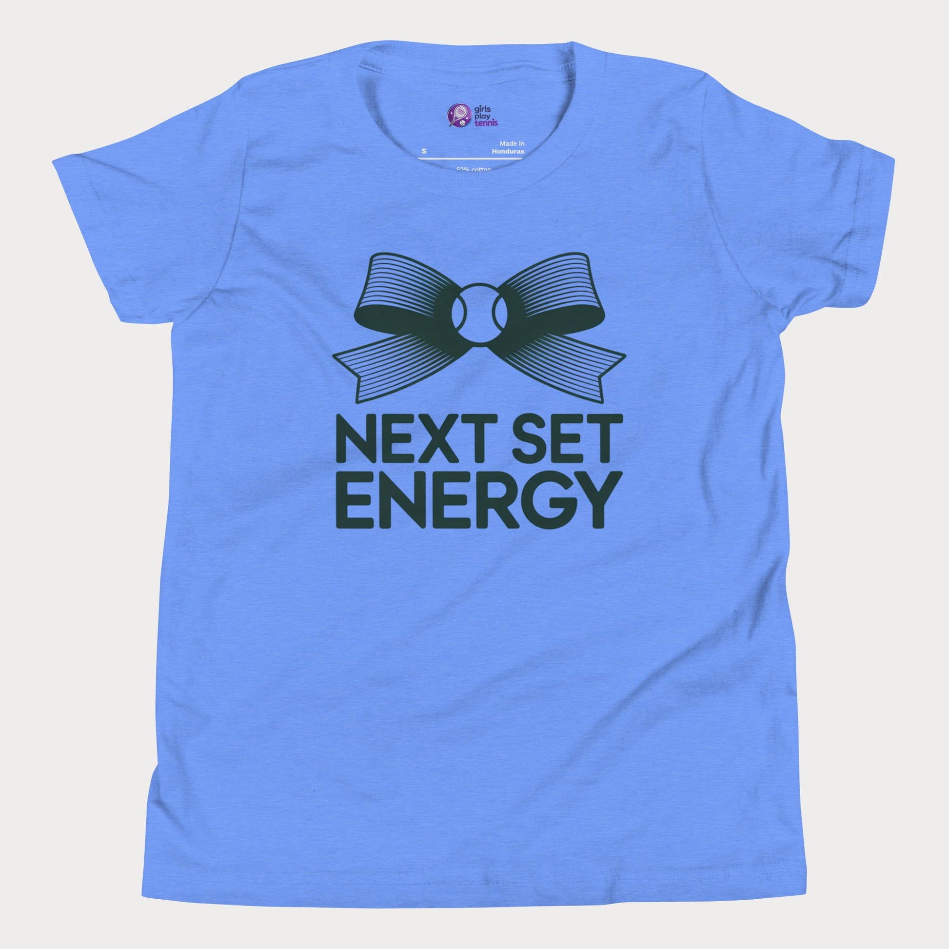 Next Set Energy tennis tee in blue with green bow and bold typography design for girls and women
