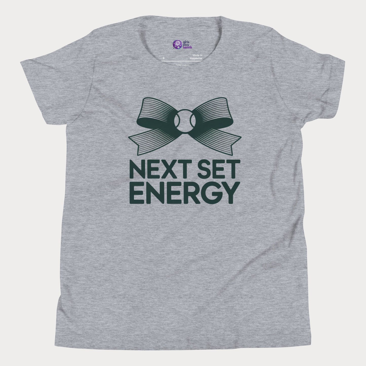 Next Set Energy tennis tee in athletic grey with green bow and bold typography design for girls and women