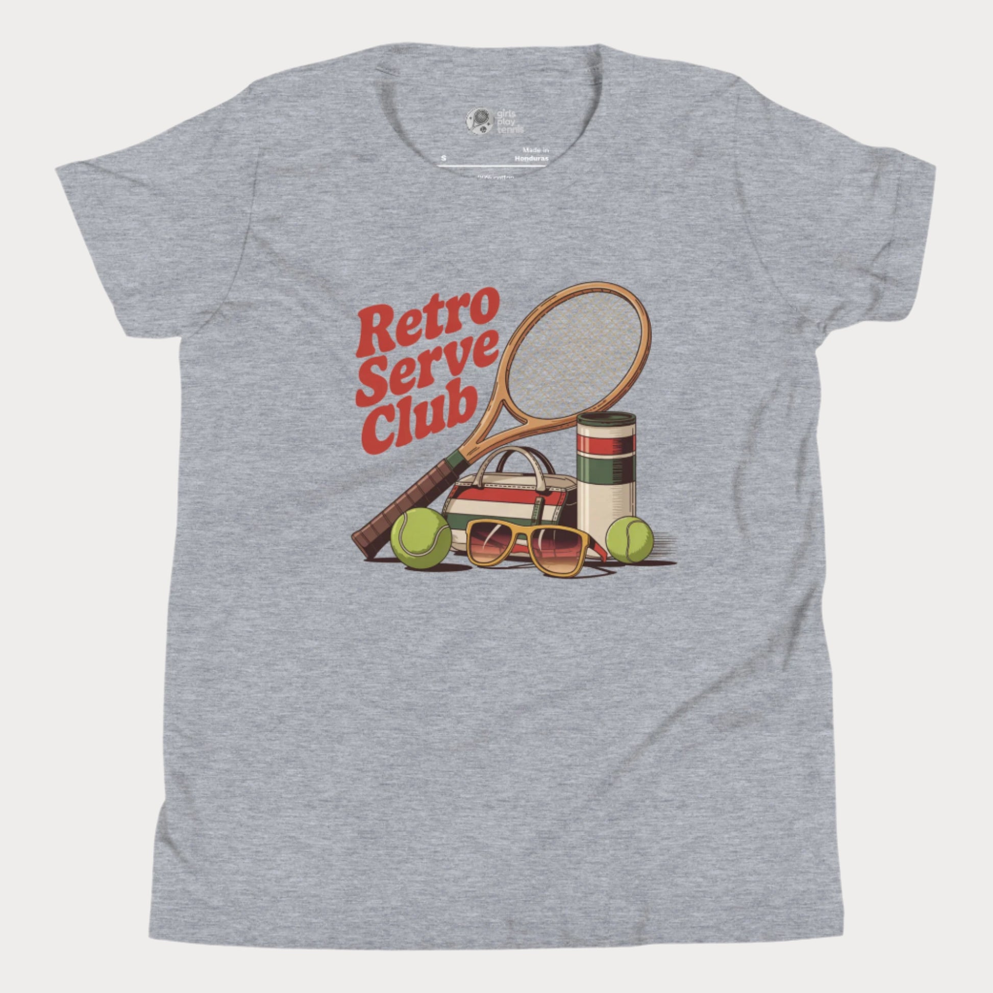 Girls tennis t-shirt design with retro tennis racket, sunglasses, and vintage-style accessories under the slogan Retro Serve Club