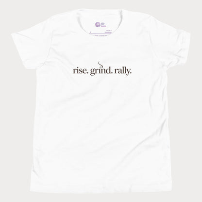 White tennis t-shirt with Rise Grind Rally slogan across the chest – Girls Play Tennis apparel.