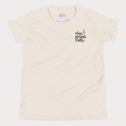 Beige tennis t-shirt with Rise Grind Rally pocket-print graphic – Girls Play Tennis apparel.