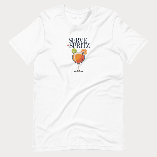 A white-colored short-sleeve tennis lifestyle t-shirt with a graphic on the chest that reads 'SERVE & SPRITZ' above an illustration of a cocktail with a tennis ball and orange slice.