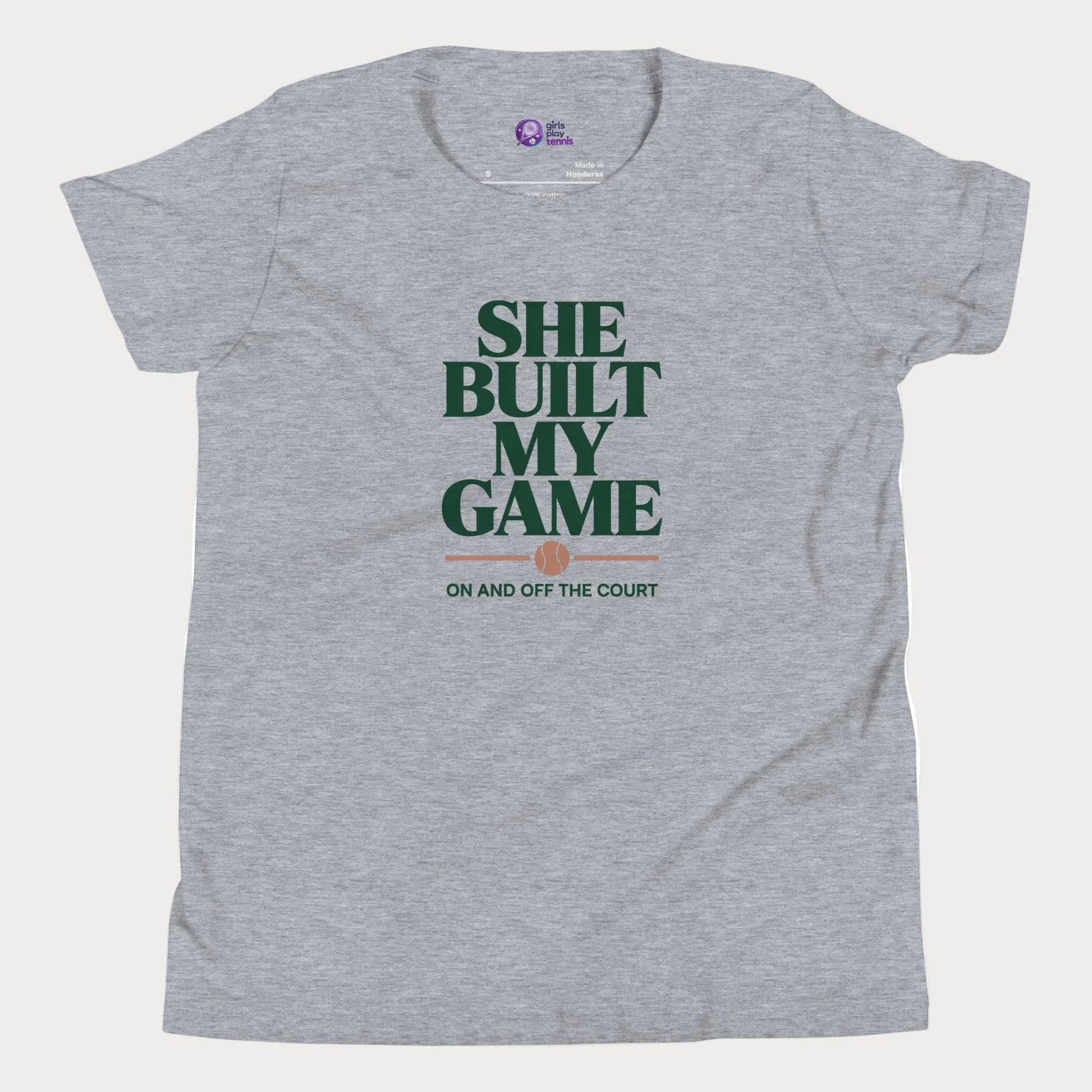 She Built My Game tennis t-shirt in athletic grey with white typography and tennis graphic for girls and women