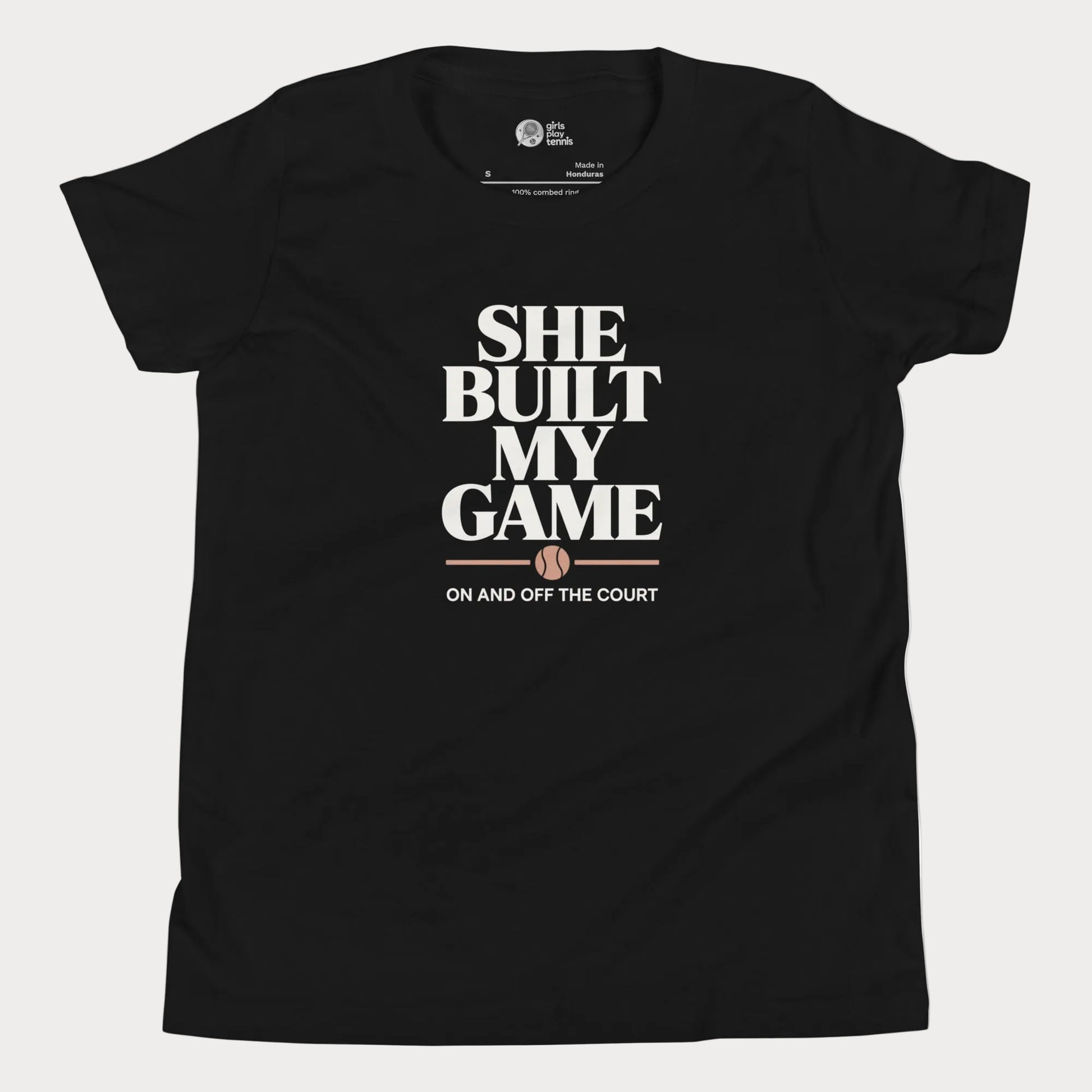 She Built My Game tennis t-shirt in black with white typography and tennis graphic for girls and women