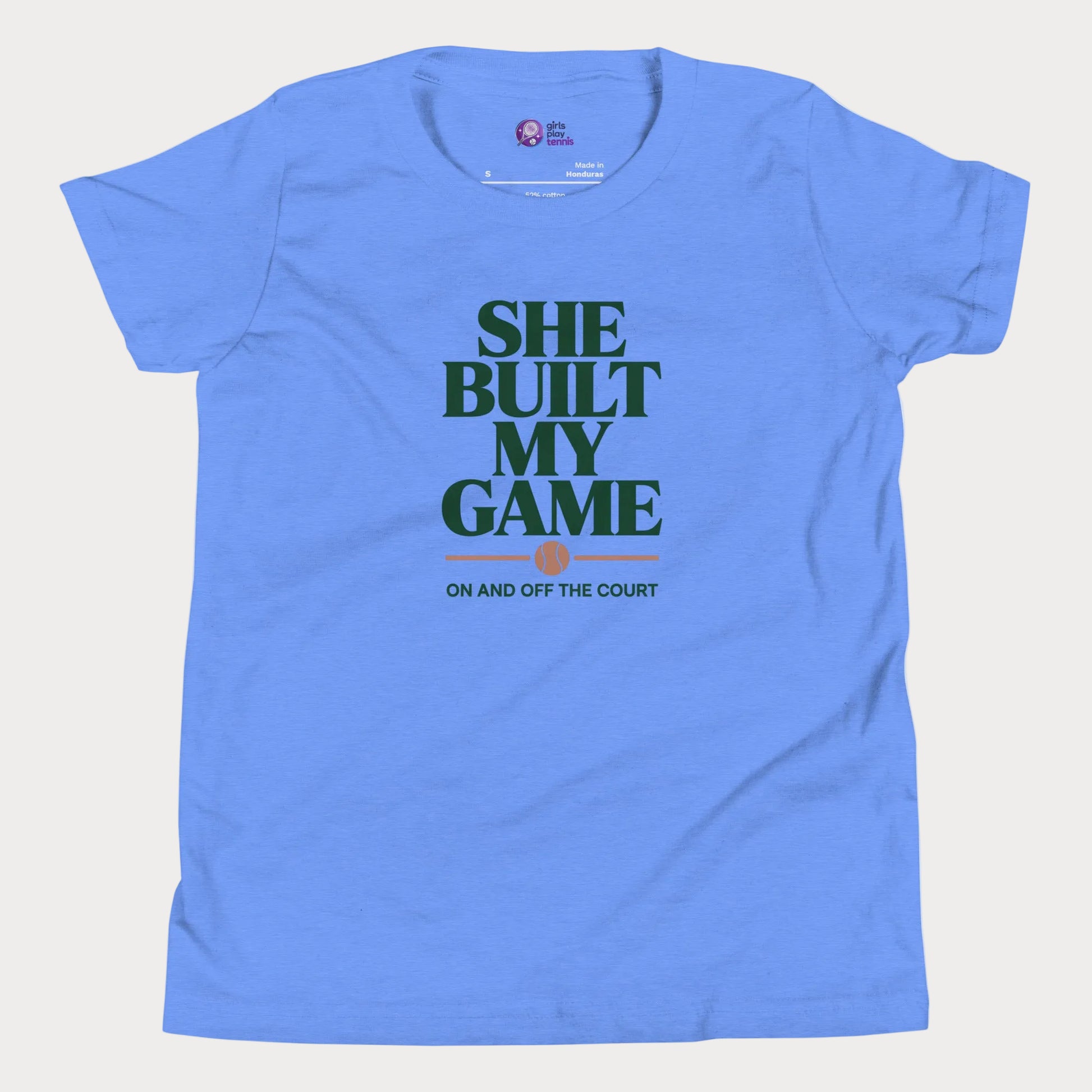 She Built My Game tennis t-shirt in blue with white typography and tennis graphic for girls and women
