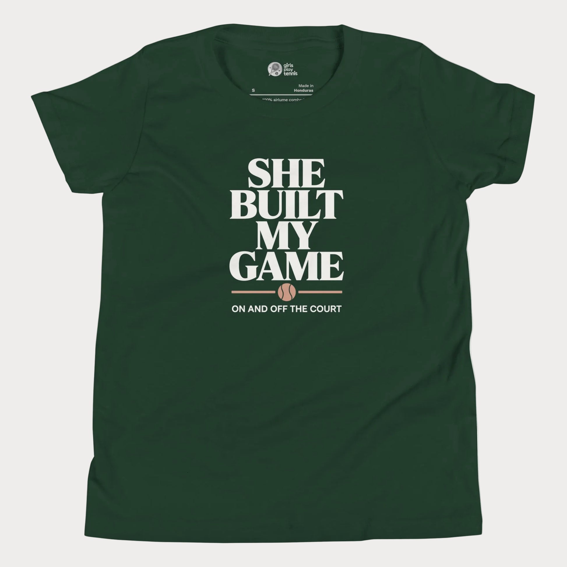 She Built My Game tennis t-shirt in black with white typography and tennis graphic for girls and women.