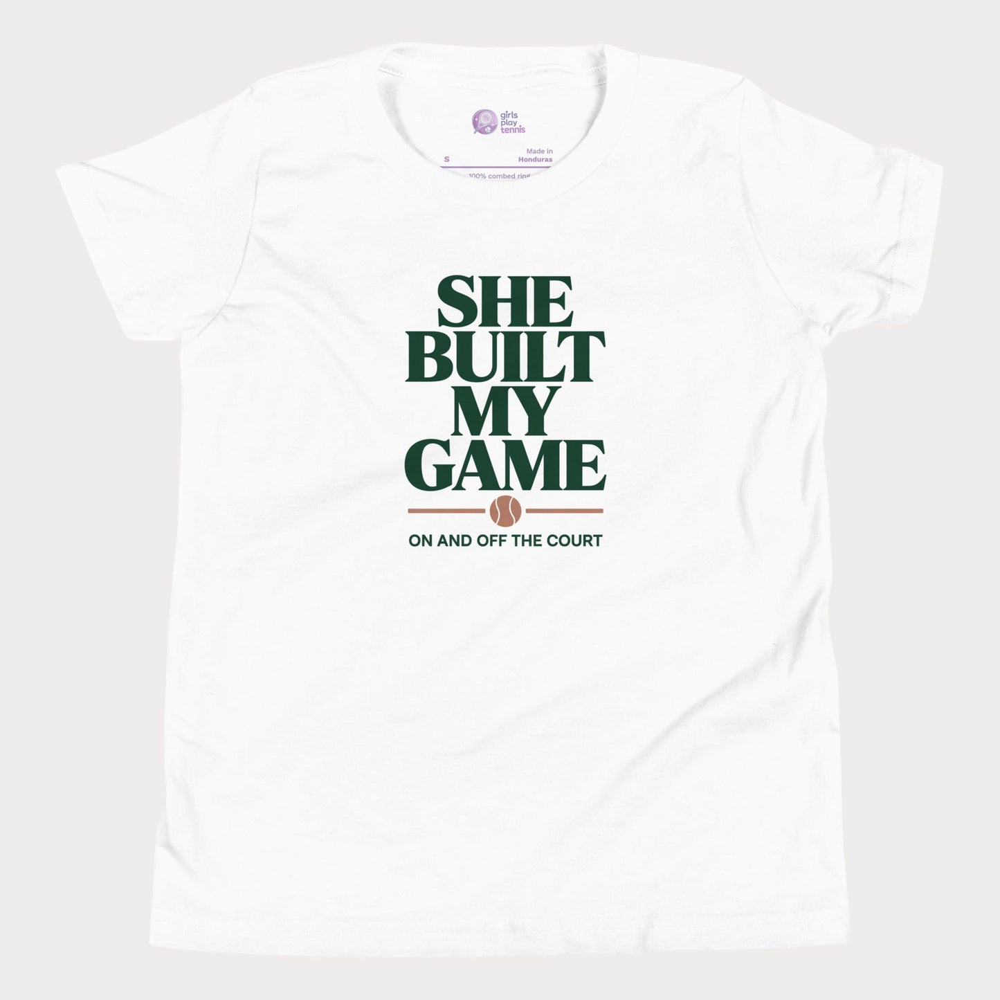 She Built My Game tennis t-shirt in white with white typography and tennis graphic for girls and women
