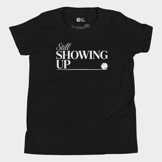 Still Showing Up tennis t-shirt in black with white typography and tennis graphic for girls and women