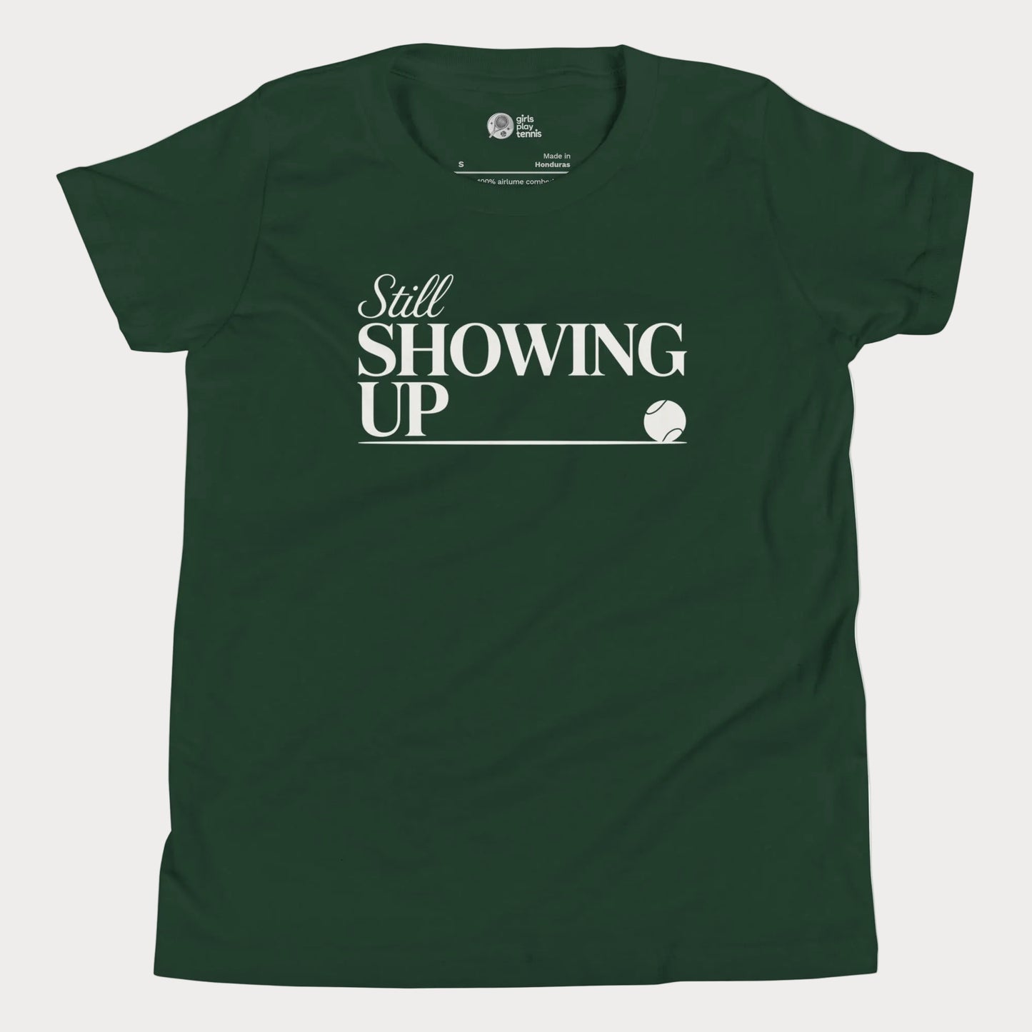 Still Showing Up tennis t-shirt in forest green with white typography and tennis graphic for girls and women