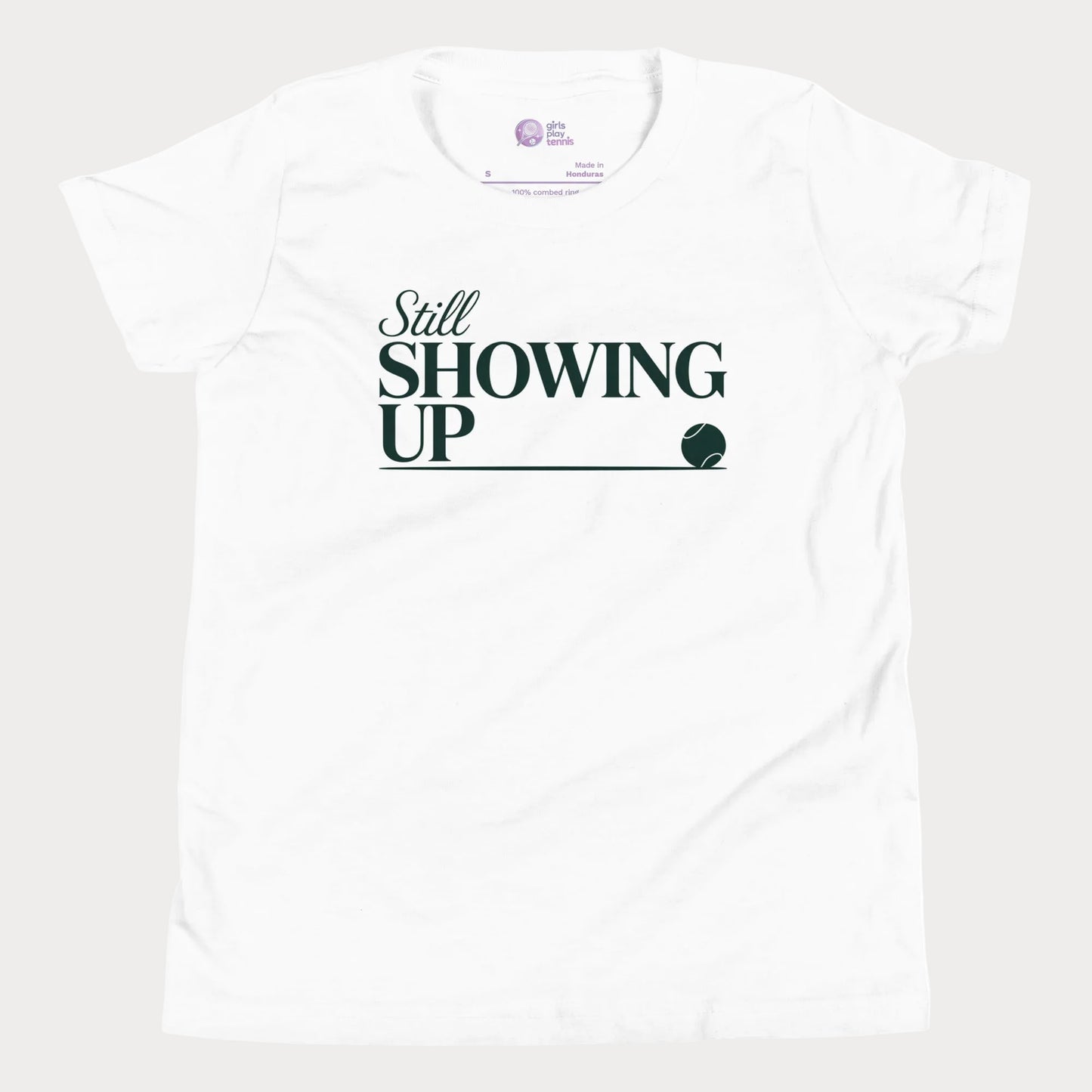 Still Showing Up tennis t-shirt in white with white typography and tennis graphic for girls and women