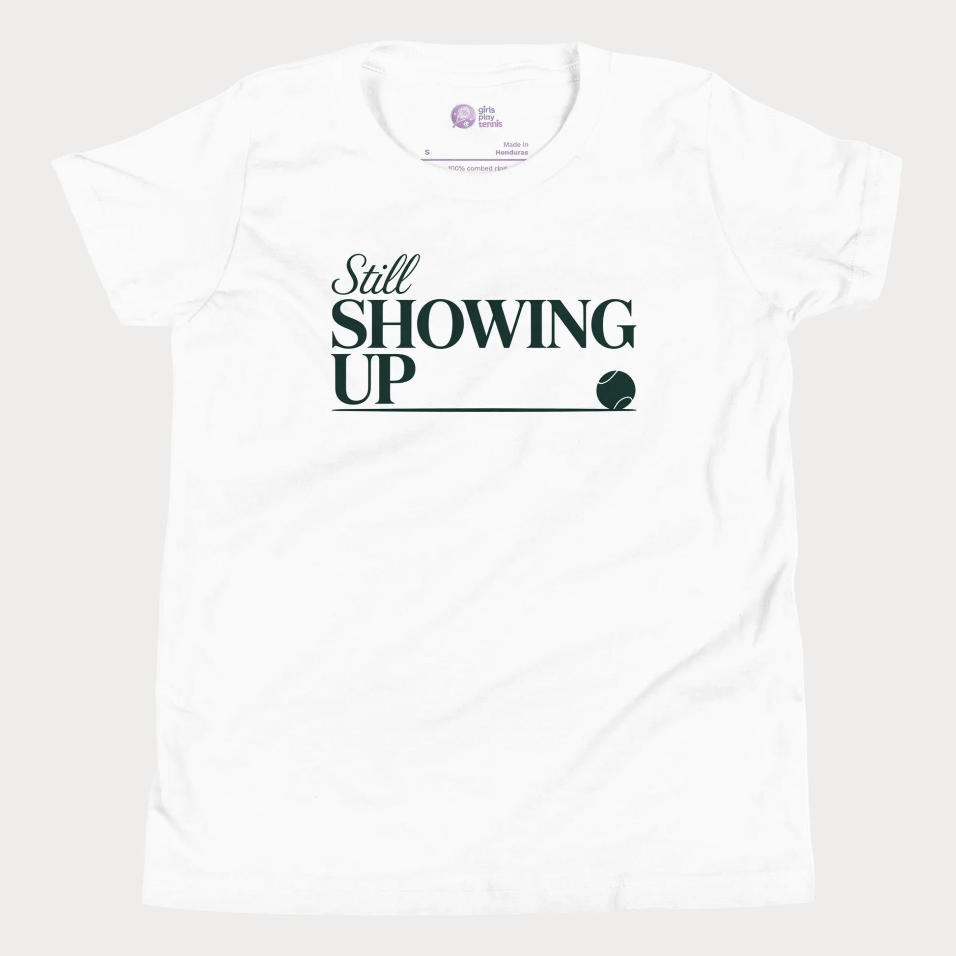 Still Showing Up tennis t-shirt in white with white typography and tennis graphic for girls and women