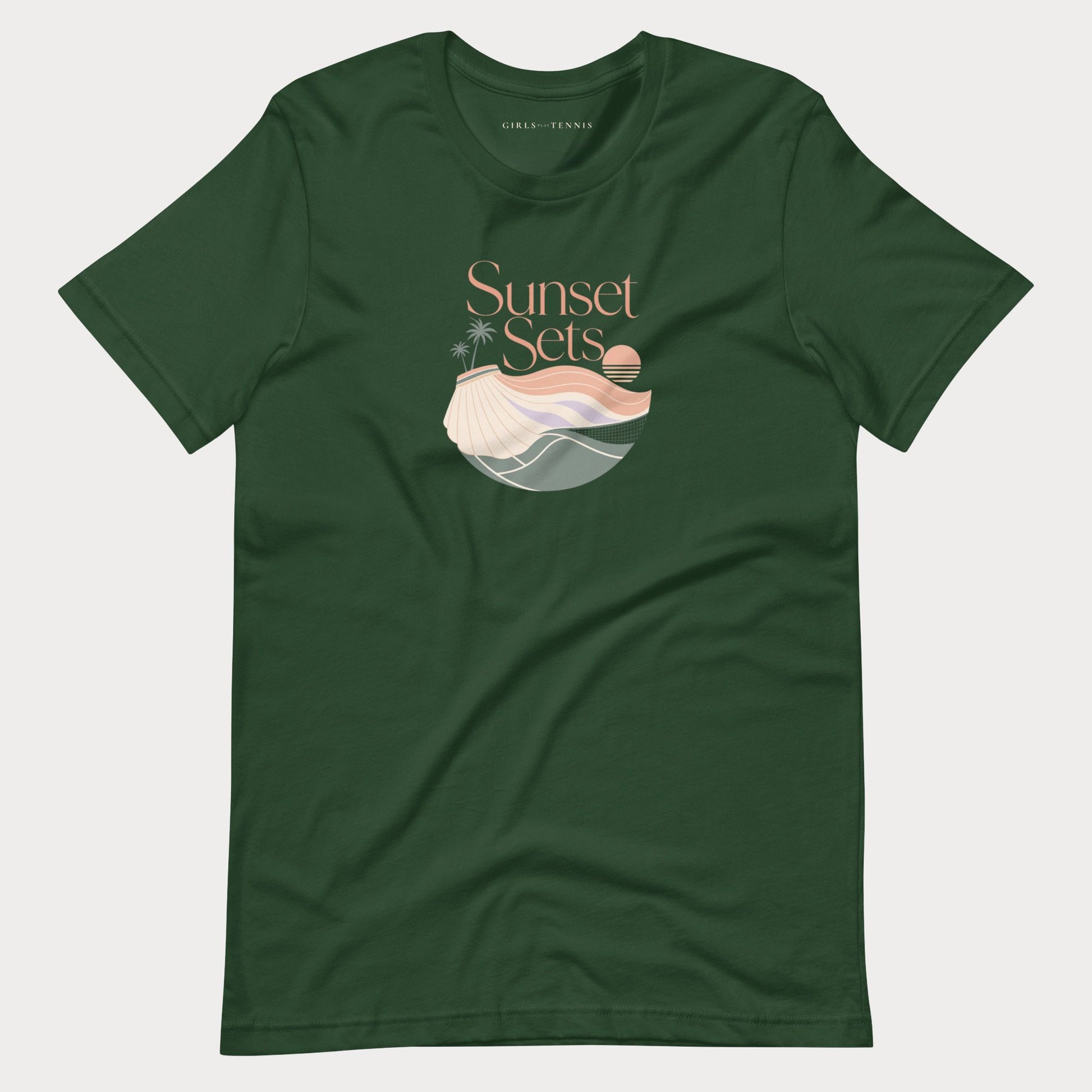 A forest green short-sleeve crewneck women's lifestyle tennis t-shirt featuring a 'Sunset Sets' graphic on the chest with a stylized beach scene and shell illustration, displayed flat against a light gray background.