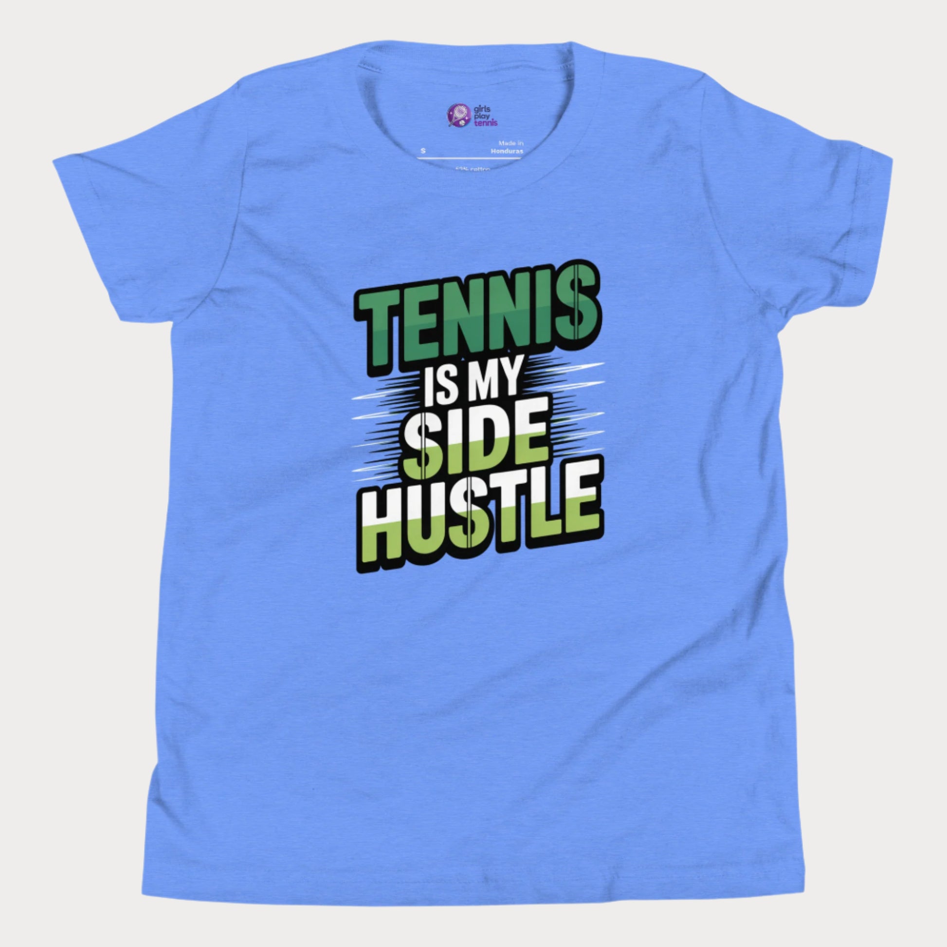 Girls tennis t-shirt with 'Tennis Is My Side Hustle' slogan, celebrating hustle and grit during hard court season.