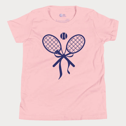 Girls and women’s tennis racket bow t-shirt in pink featuring crossed rackets tied in a bow design, inspired by tennis style and everyday wear