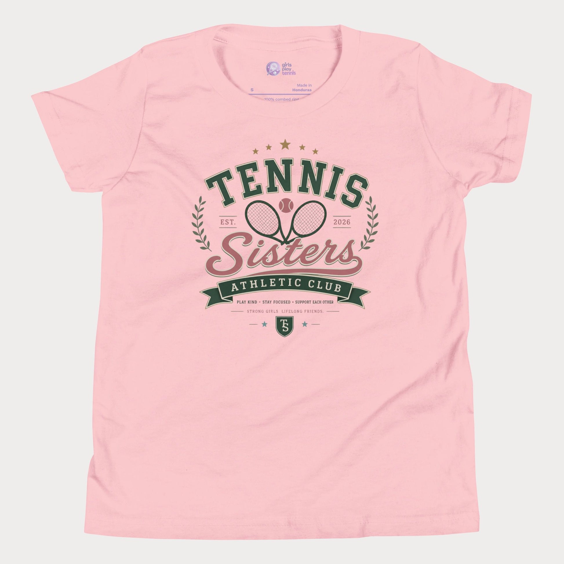 Pink t-shirt with 'Tennis Sisters Athletic Club' design on a light gray background