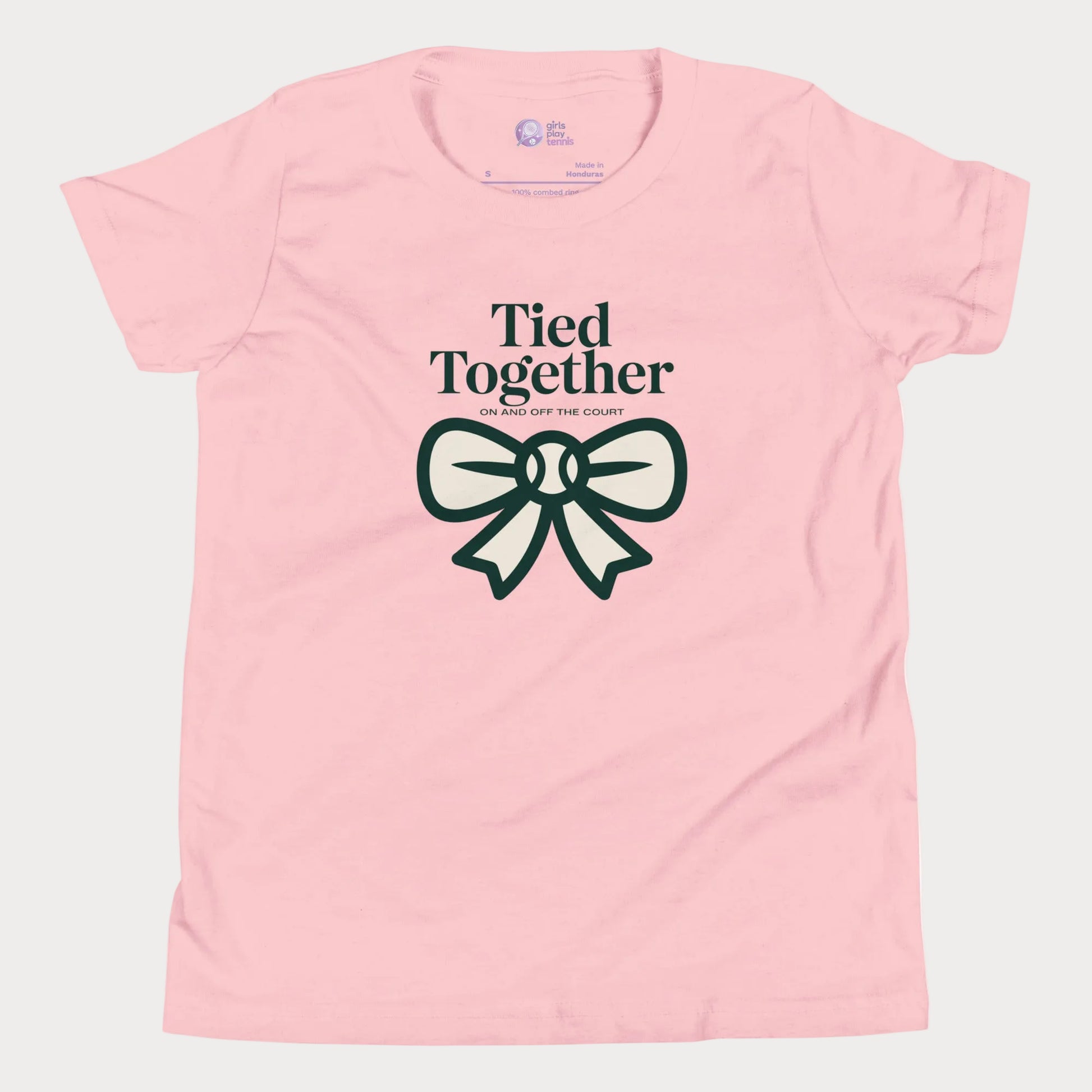 Tied Together tennis t-shirt in soft pink with green bow graphic for girls and women