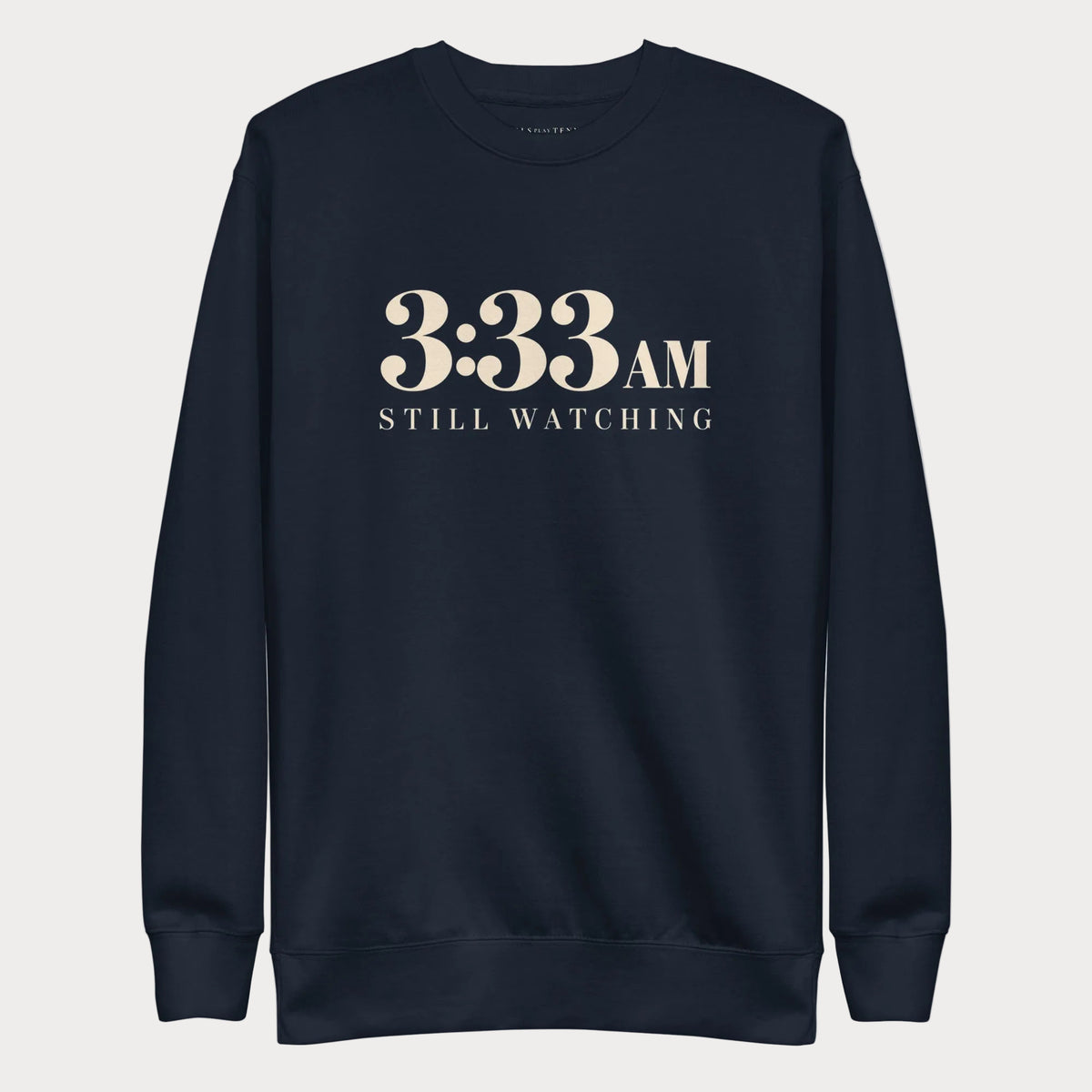 Navy 3:33 AM women's tennis crewneck sweatshirt with cream lettering reading 3:33 AM above Still Watching