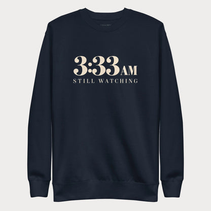 Navy 3:33 AM women's tennis crewneck sweatshirt with cream lettering reading 3:33 AM above Still Watching