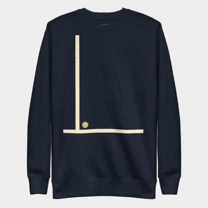 Navy Court Lines Study No. 1 women's tennis crewneck sweatshirt with a vertical cream line meeting a horizontal line with a small tennis ball at the corner