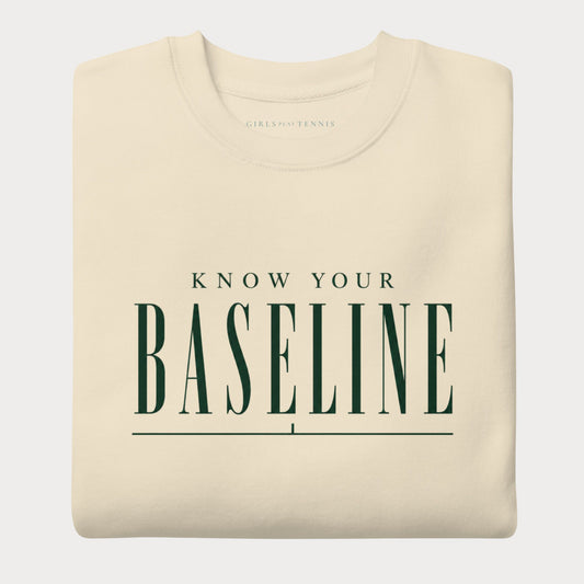 Folded bone Know Your Baseline women's tennis crewneck sweatshirt with forest green lettering reading Know Your Baseline above an underline rule