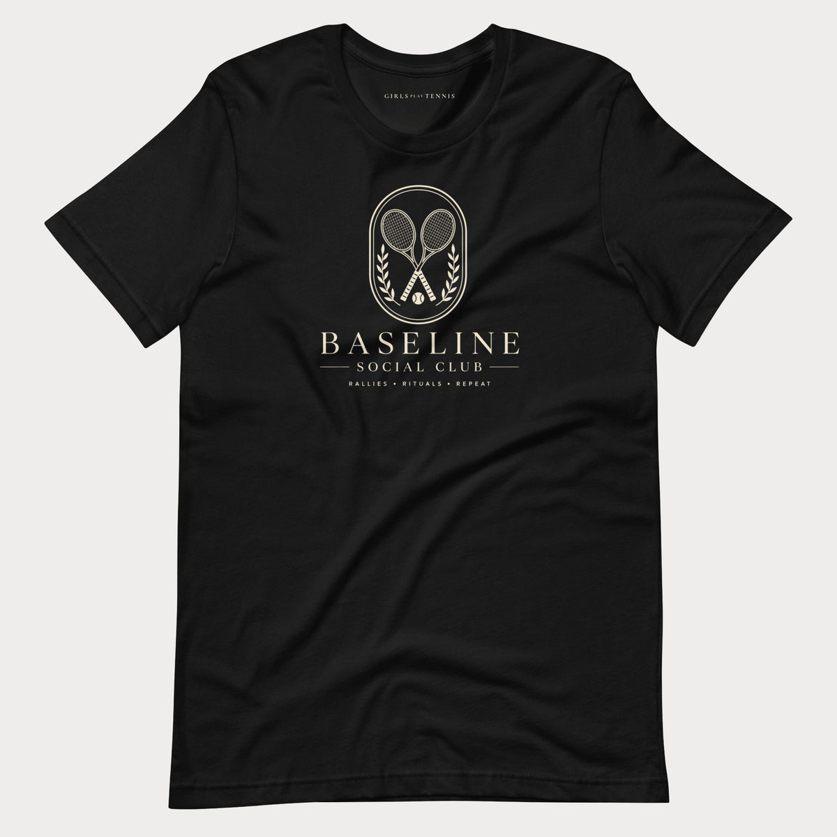 Black Baseline Social Club women's tennis T-shirt with a crest of crossed rackets and laurel above the words Baseline Social Club