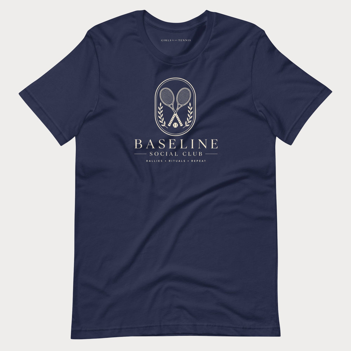 Navy Baseline Social Club women's tennis T-shirt with a crest of crossed rackets and laurel above the words Baseline Social Club