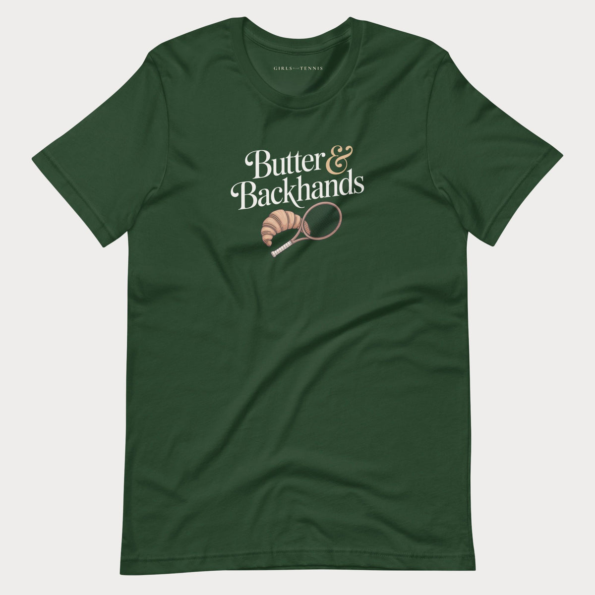 Forest green Butter & Backhands women's tennis T-shirt with a croissant and tennis racket graphic