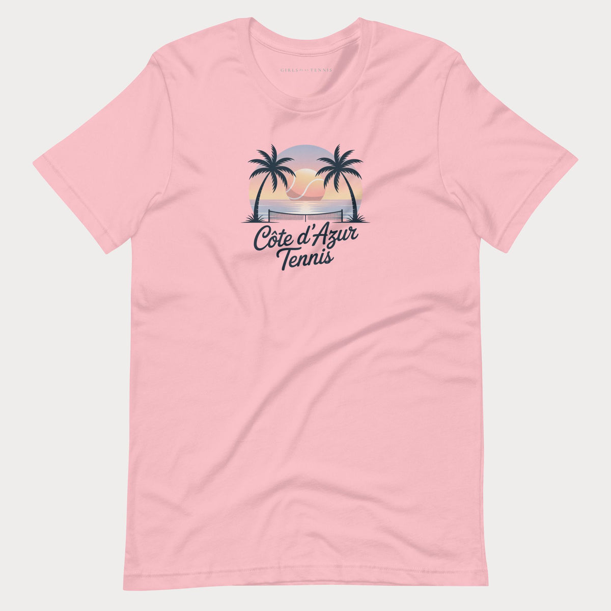 Pink Côte d'Azur women's tennis T-shirt with palm trees and a sunset graphic above script lettering