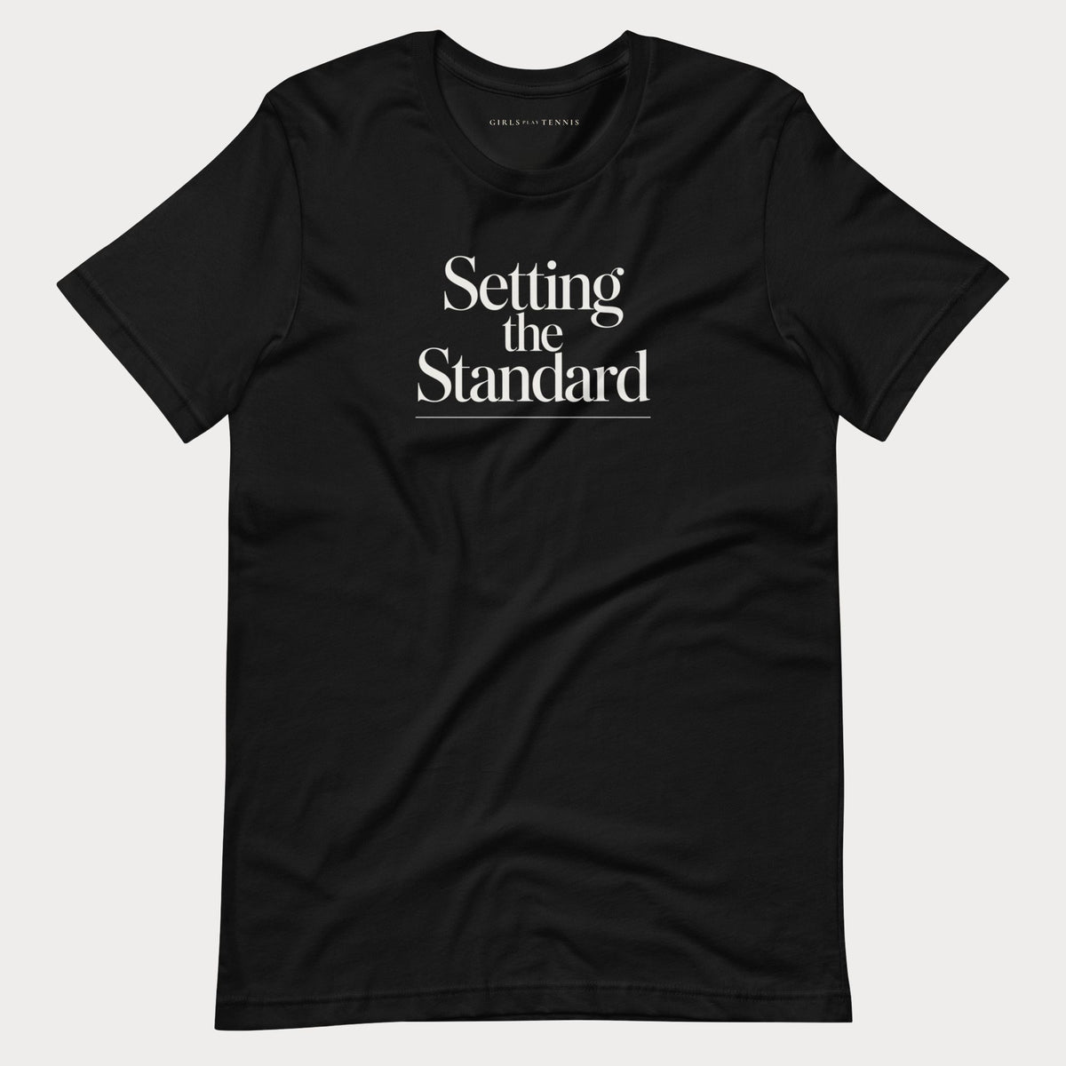 Black Setting the Standard women's tennis T-shirt with stacked serif lettering and a thin underline